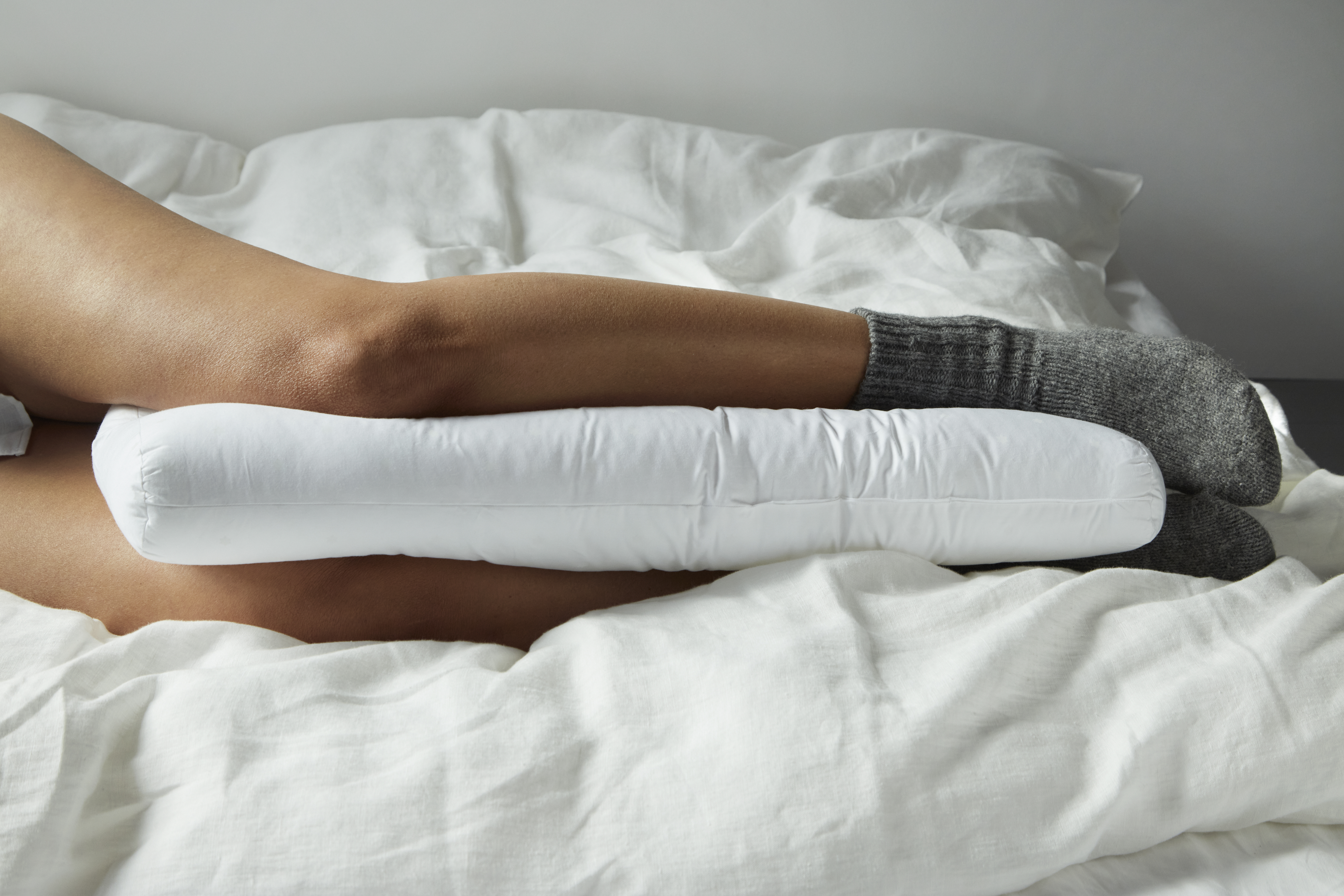 Five Compelling Reasons to Introduce a Pillow Between Your Knees at Night